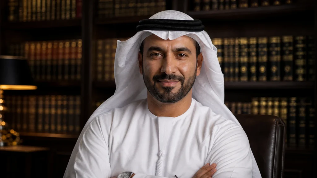 Legal documents and blueprints representing Dubai real estate and construction law compliance.